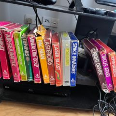 Atari 2600 Space Invaders Woody Atari 2600 with 15 individual games and 14 game Indy 500 driving