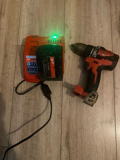 Nearly new Milwaukee M18 red 4.0 new charger pack and box