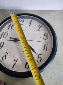 Da Vinci wall clock quartz black plastic frame in working order none ticking..