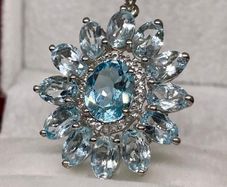 Silver pendant with Swiss Blue Topaz and white zircons