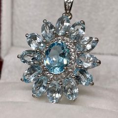 Silver pendant with Swiss Blue Topaz and white zircons