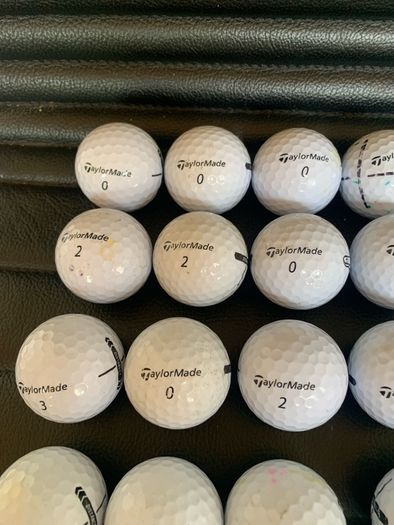 (23) TaylorMade Distance golf balls