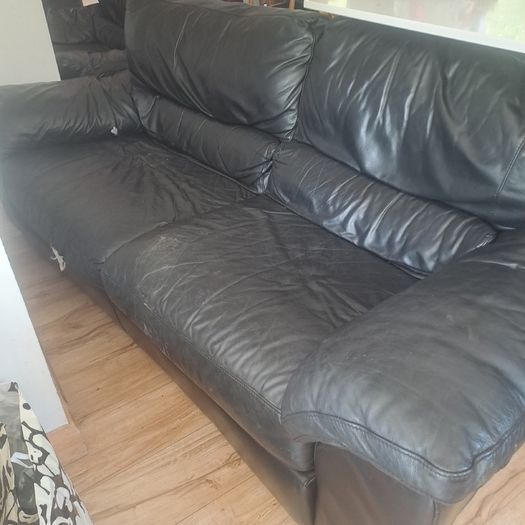 Black leather sofas