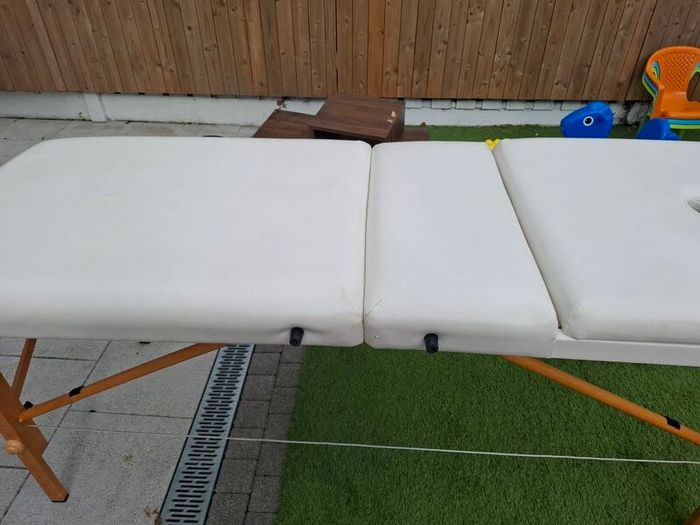 Massage table