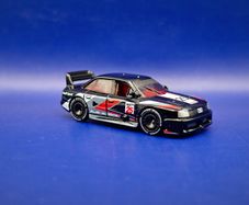 Hot Wheels Audi 90 Quattro with custom wheels.
