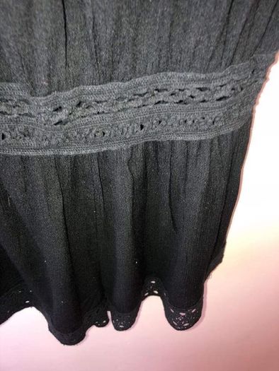 Black playsuit (size 8)