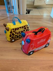 2 Trunki Suitcases (giraffe and fire truck)