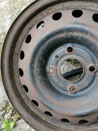 2 x steel rims 15", 4 stud, about 114mm ish from hole centre to the opposite home centre... Possibly fit a nissan etc