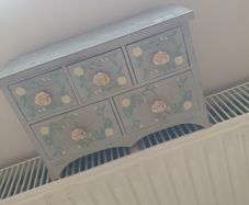 small wooden jewelry chest