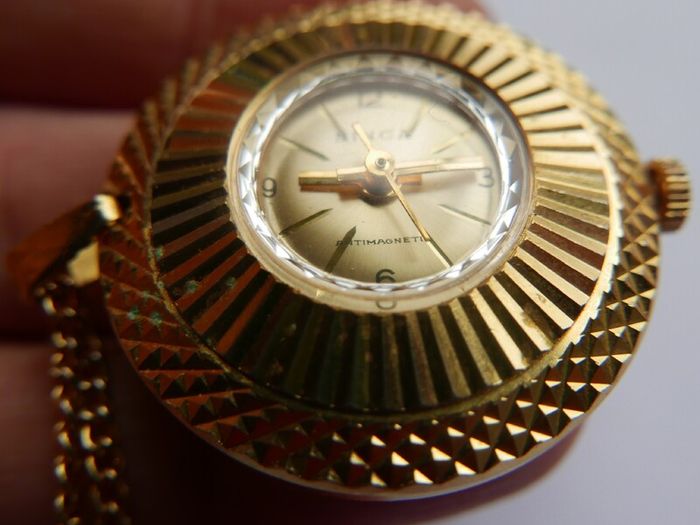 Vintage gold-plated Simca Antimagnetic Pendant Mechanical Watch W/necklace.(works well)