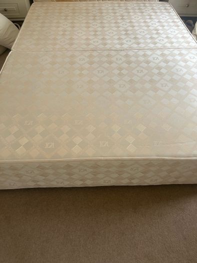 King size bed with optional mattress included.