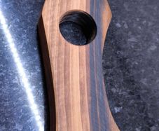 One piece of solid European Walnut, no glue, no joints. Hand-sanded and oiled with food-safe oi
