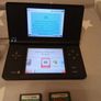 nintendo dsi black + 2 great games Image 3