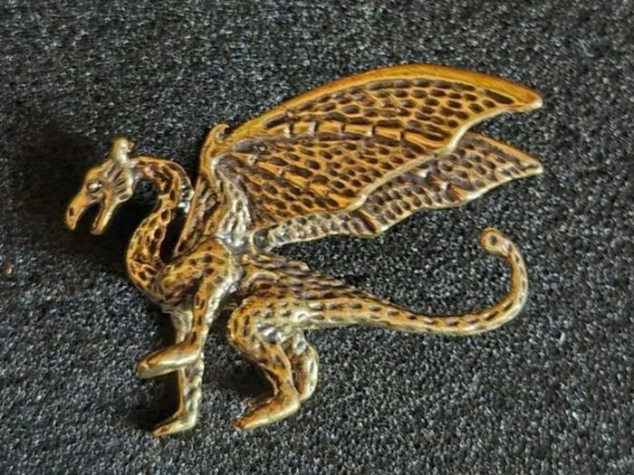 4 brass dragons.