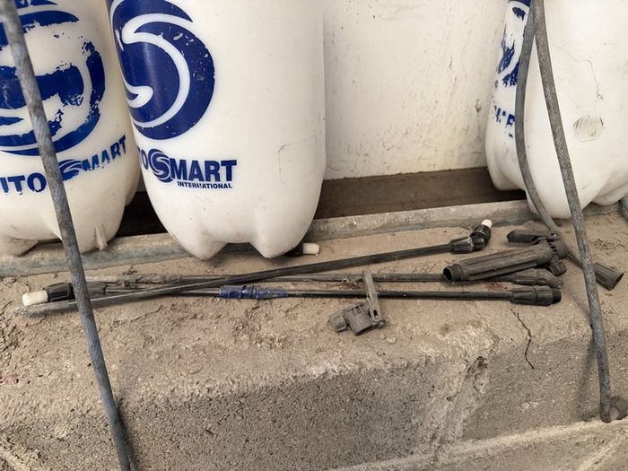 5 old pump bottles and parts