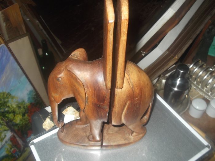 a pair of vintage wooden elephant bookends
