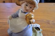 Vintage Porcelain figurine girl holding cat