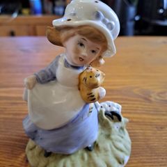 Vintage Porcelain figurine girl holding cat