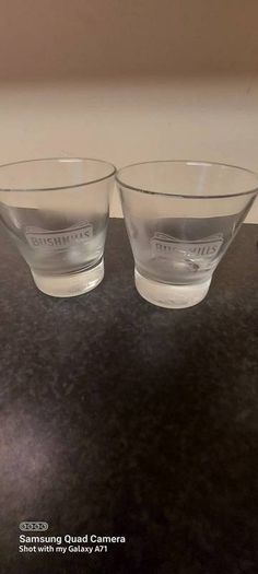 bushmills tumbler glasses x 2,price includes post to anywhere in Ireland, collectors item,
