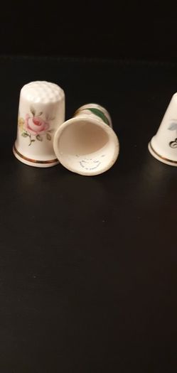 Collection of Flower Themed Gold Coloured Edged Thimbles
