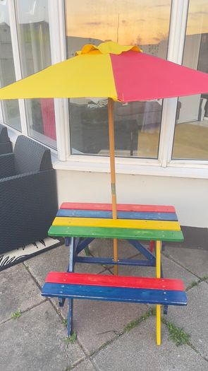 Picnic table with parasol