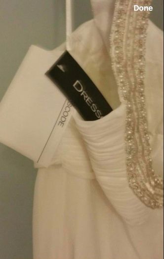 NEW with tags - Dresscode handmade designer wedding dress - size 16 but will suit size 8-16 due to the way it's specially made to alter