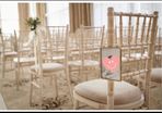 Twelve hanging photo frames for chairs / pews for wedding