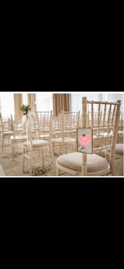 Twelve hanging photo frames for chairs / pews for wedding