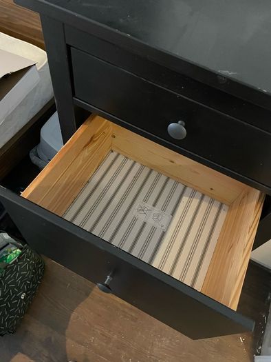 Black five-drawer chest of drawers