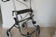 Walker Rollator with seat and basket. . Great quality thick wheels for outdoors