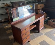traditional English-style mahogany furniture, this twin-pedestal dressing table, five drawer chest of drawers to match and dressing table stool