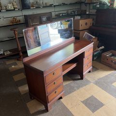 traditional English-style mahogany furniture, this twin-pedestal dressing table, five drawer chest of drawers to match and dressing table stool