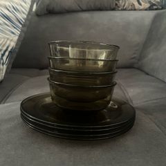 Set of 4 black glass bowls and plates