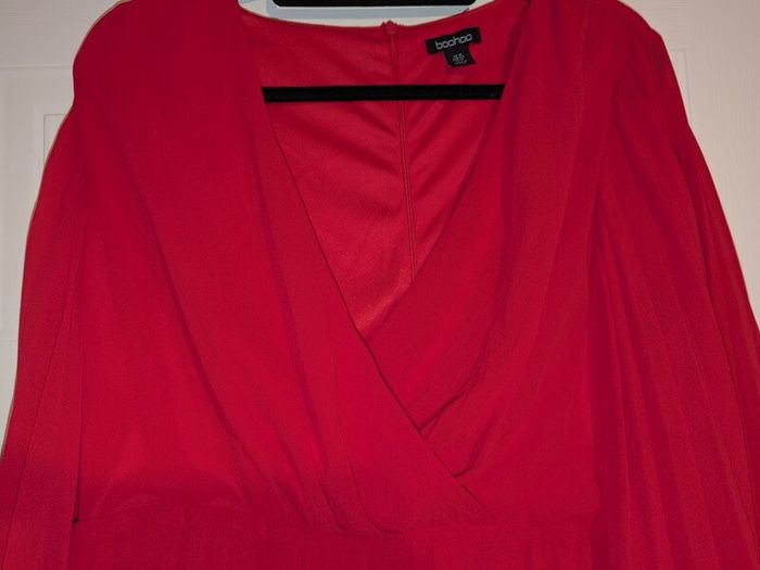 stunning red long and wide sleeve pleated midi dress from Boohoo