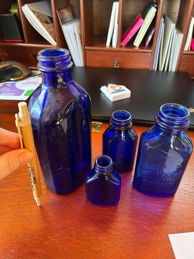 Antique bottles milk of magnesia