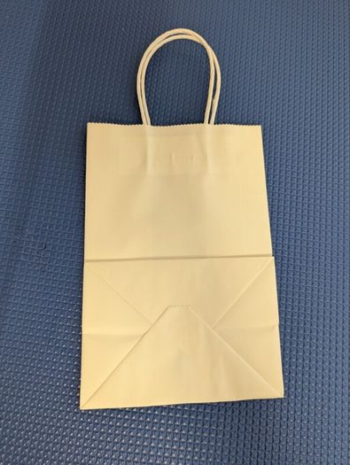 Small white paper bags