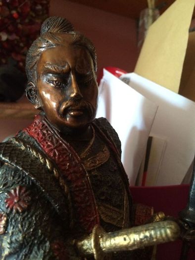A fine bronze of a samurai signed  MIYAO