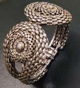 Silver tone textured hinged cuff bracelet