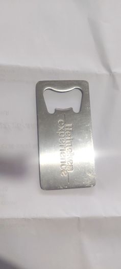 heineken bottle opener, see pictures for condition, buyer collects or pays postage thank you,sold as is
