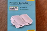 TP-Link AV600 Powerline Starter Kit, model TL-PA4010 KIT. Includes 2 powerline adapters and original box. Plug and play, ideal for extending wired internet connection to another room.