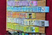 Pokemon large Sized Storage Tin and 250 cards and 2 v/ex cards