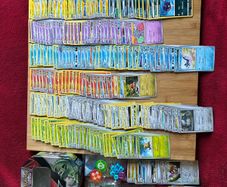 Pokemon large Sized Storage Tin and 250 cards and 2 v/ex cards