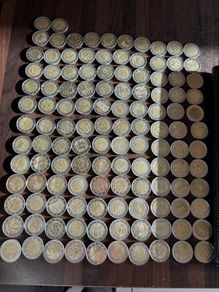 2 Euro commemorative coins in used/good condition + album