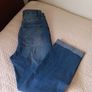 Mid-wash Distressed Jeans with Cuffed Hem. Image 8