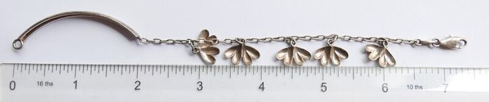 Vintage 925 Sterling Silver charm bracelet with flower charms