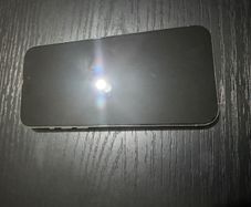 iphone 15 pro max natural titanium 256gb  mint condition and genuine apple airpods
