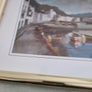 Framed signed print of sea side village. Image 5