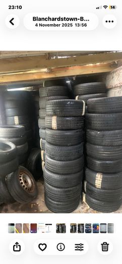 Red mount wheel balancer and 100 part worn tyres for sale