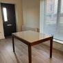 Domitalia extendable glass dining table. Image 5