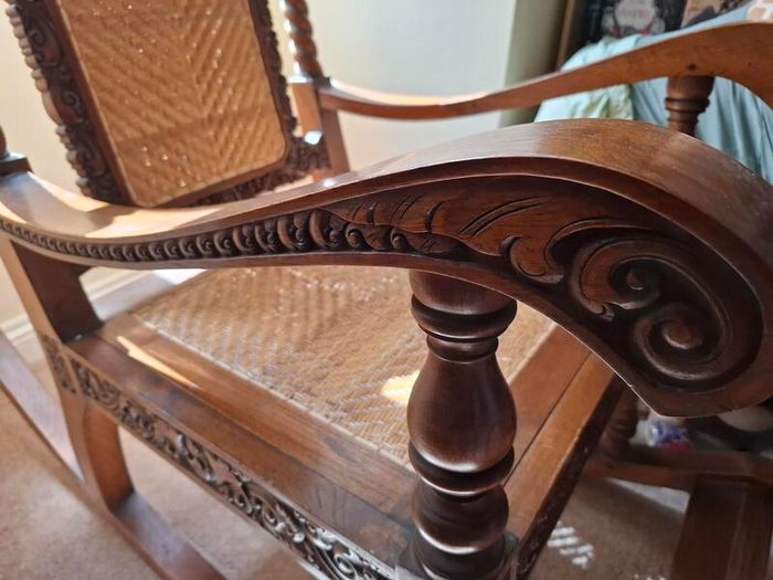 Hand Carved highly ornate Hardwood Rocking chair